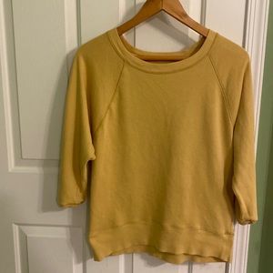 Long sleeved yellow sweatshirt